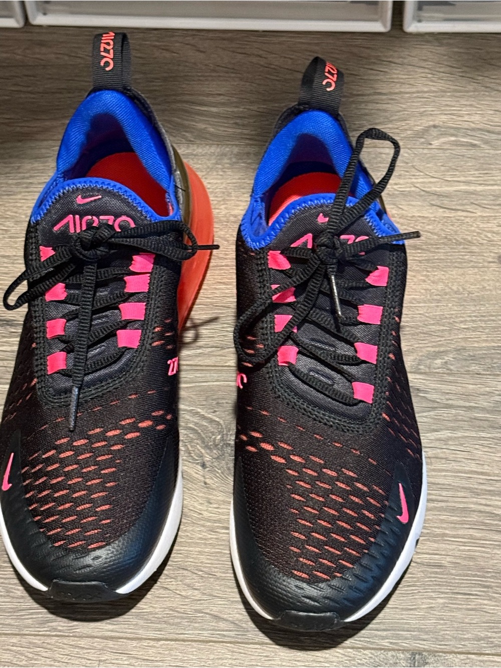 Nike Black Shoes with Pink Accents and Blue Lining